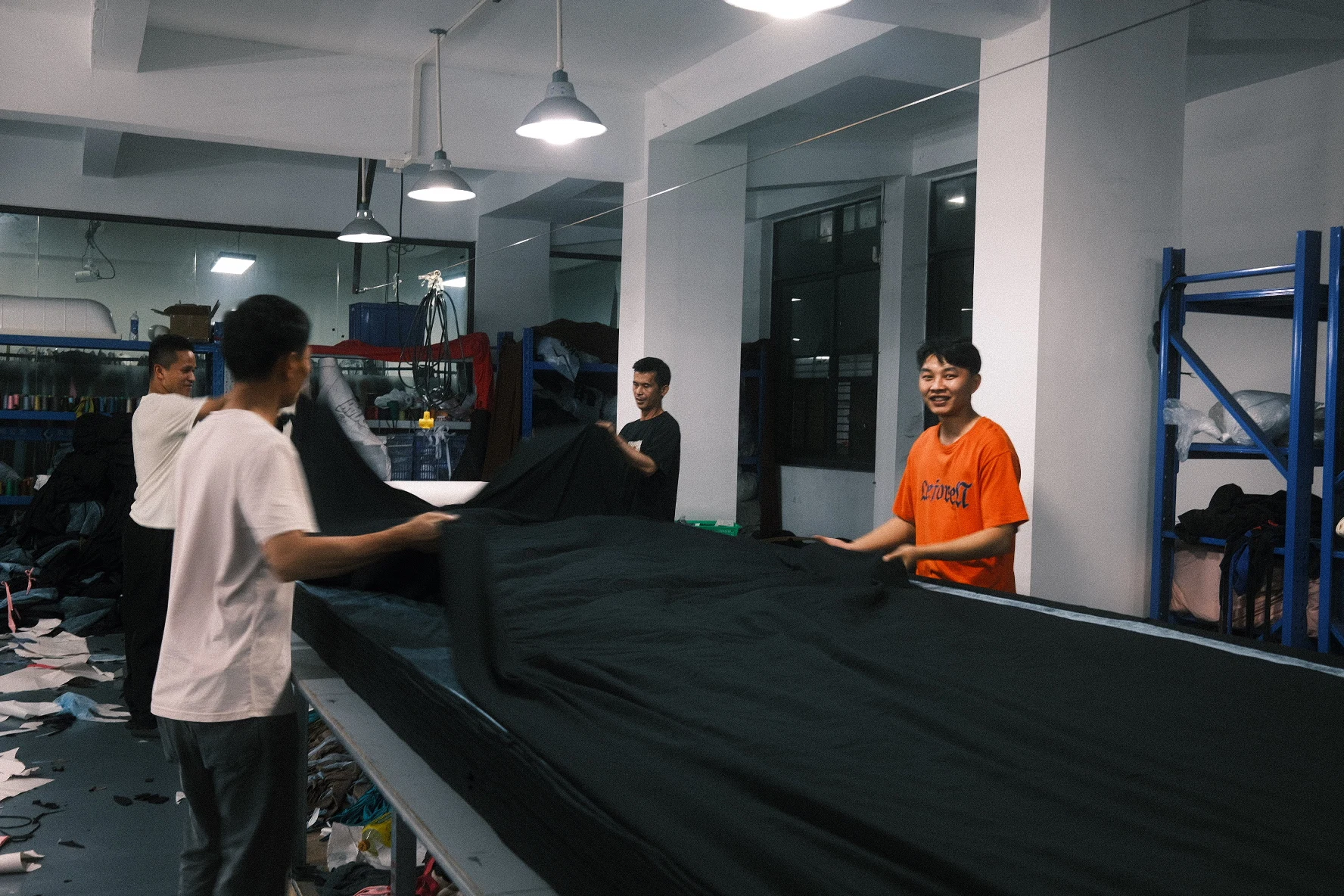 Blesstop team working together on fabric cutting