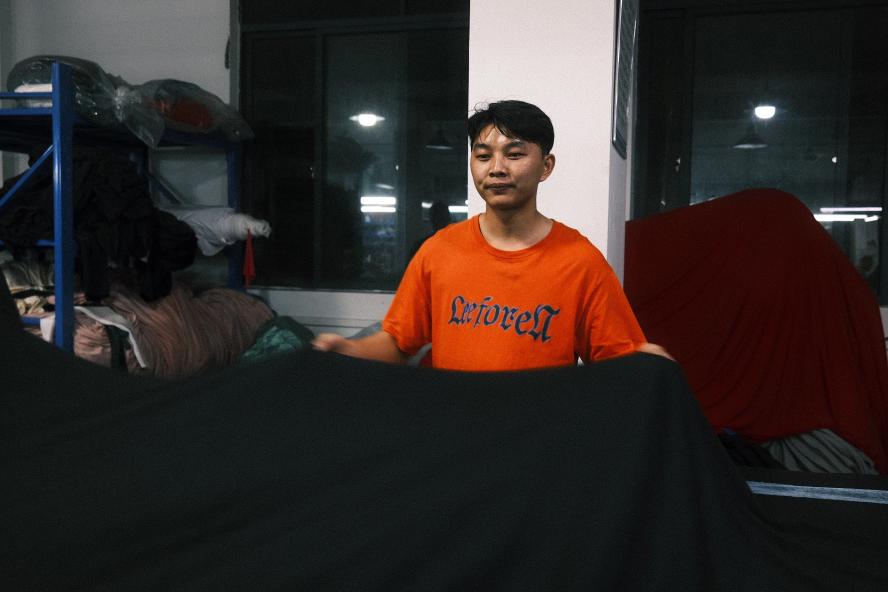 Blesstop team member preparing garment fabric